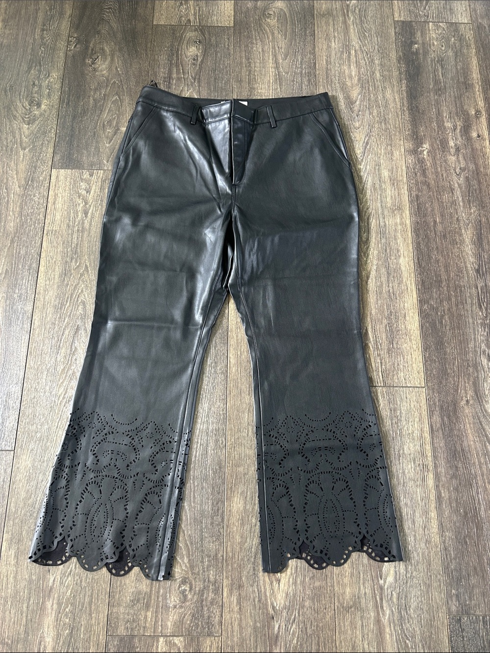 Anthropologie Black Faux Leather Flare Pants with Scalloped Laser-Cut Hem